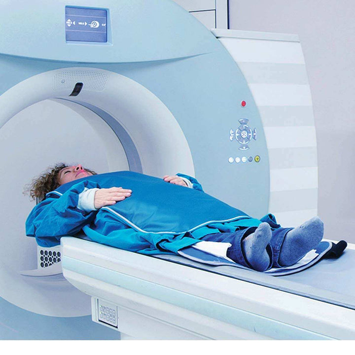 CT examination for patient with lead protection blanket - Deutsch Medical